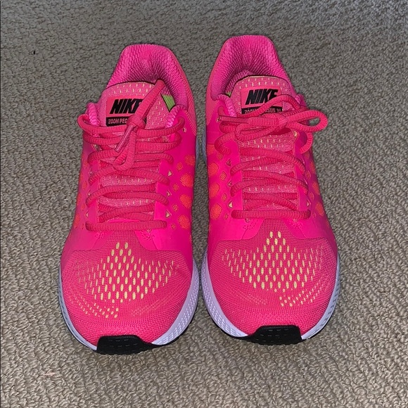 neon green and pink nike shoes